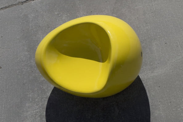 yellow smooth glossy concrete stone armchair indoor outdoor street furniture