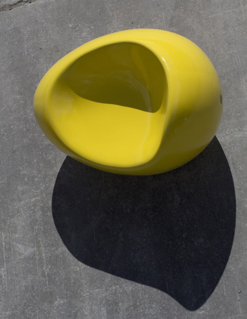 yellow smooth glossy concrete stone armchair indoor outdoor street furniture