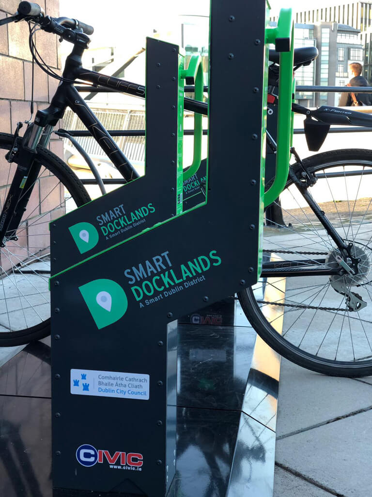 urban transit bike parking solution technology phone app locking bike parking solar powered
